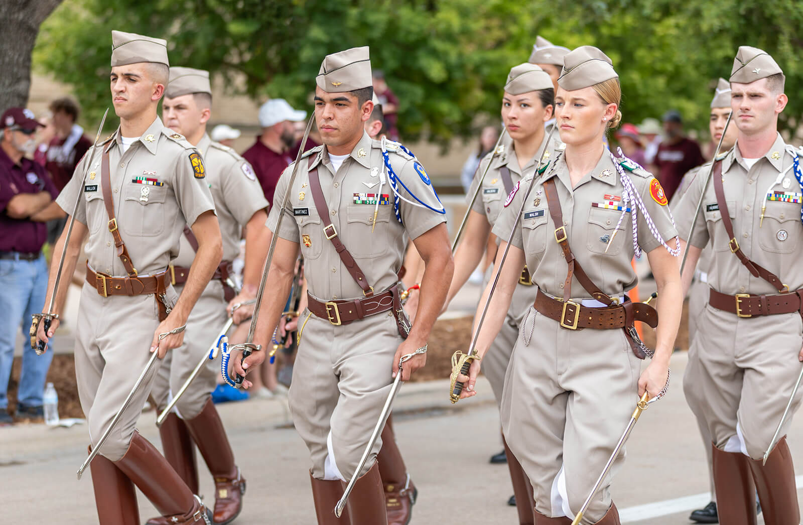 Photo of Cadets with Sabers and Sam Brownes